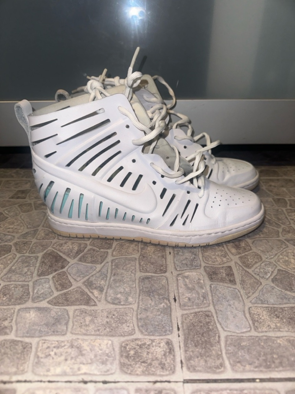 Nike White High-Top Sneakers with Teal Interior Accents